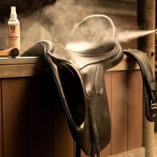 LISS Leather Care spray applied to a leather saddle